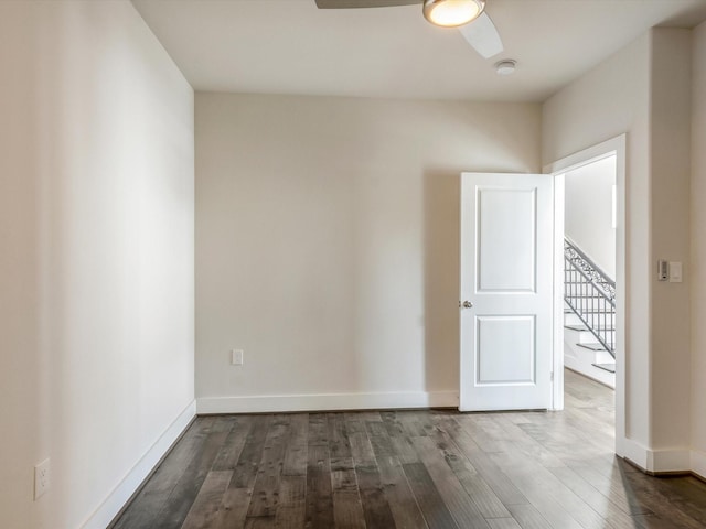 2301 Arabelle St, Houston, TX 77007 - unfurnished room featuring a ceiling fan, dark wood finished floors, baseboards, a smoke detector, and stairway