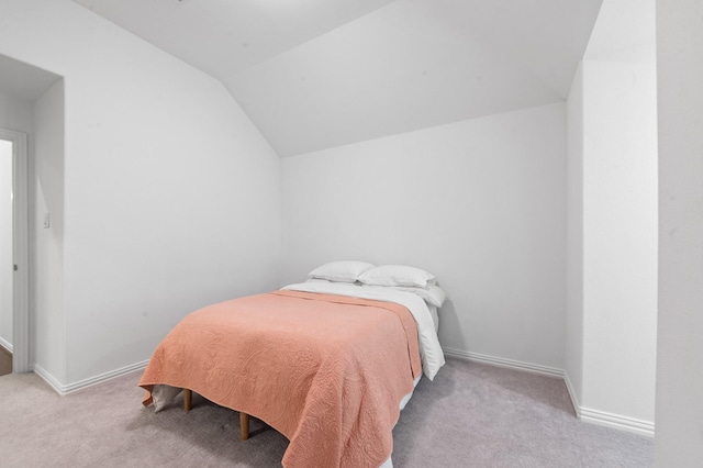 15603 Adobe Brick Ct, Cypress, TX 77433 - bedroom featuring carpet, vaulted ceiling, and baseboards