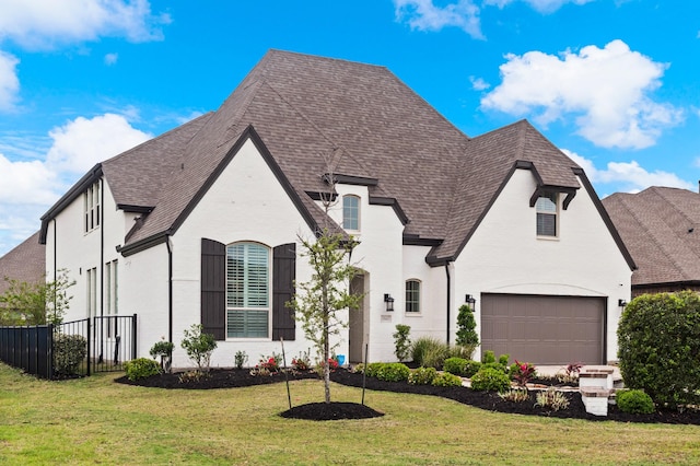 15603 Adobe Brick Ct, Cypress, TX 77433 - french country style house featuring roof with shingles and a garage
