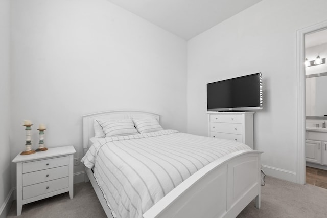 15603 Adobe Brick Ct, Cypress, TX 77433 - bedroom featuring carpet, baseboards, and ensuite bath