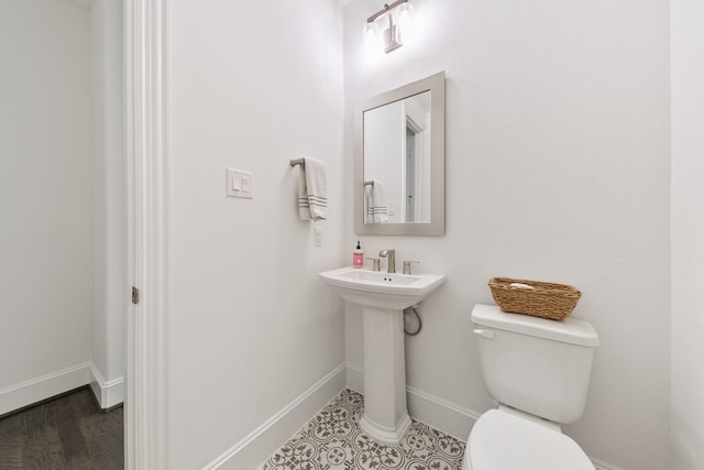 15603 Adobe Brick Ct, Cypress, TX 77433 - bathroom featuring toilet and baseboards