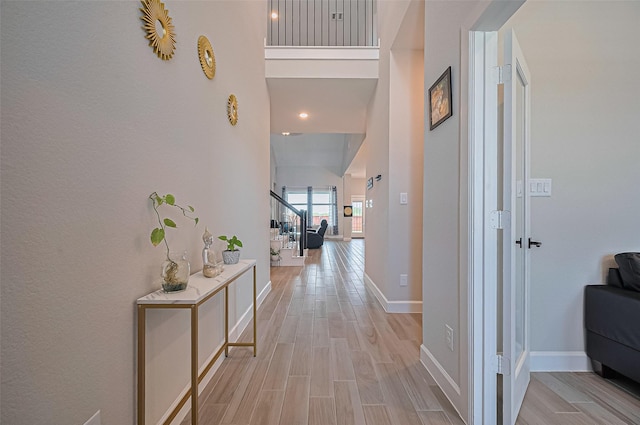 13811 Via Toluca Trl, Cypress, TX 77433 - hallway with light wood-style flooring and baseboards