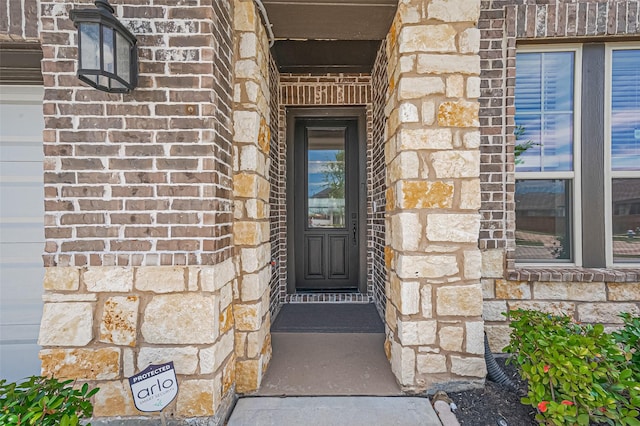13811 Via Toluca Trl, Cypress, TX 77433 - view of exterior entry with brick siding and stone siding