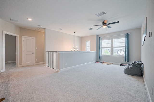 13811 Via Toluca Trl, Cypress, TX 77433 - carpeted spare room with ceiling fan, a chandelier, baseboards, and attic access