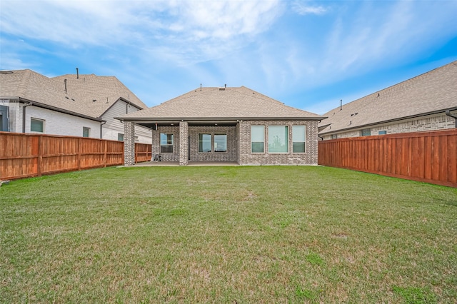 13811 Via Toluca Trl, Cypress, TX 77433 - back of house featuring a patio, brick siding, and roof with shingles