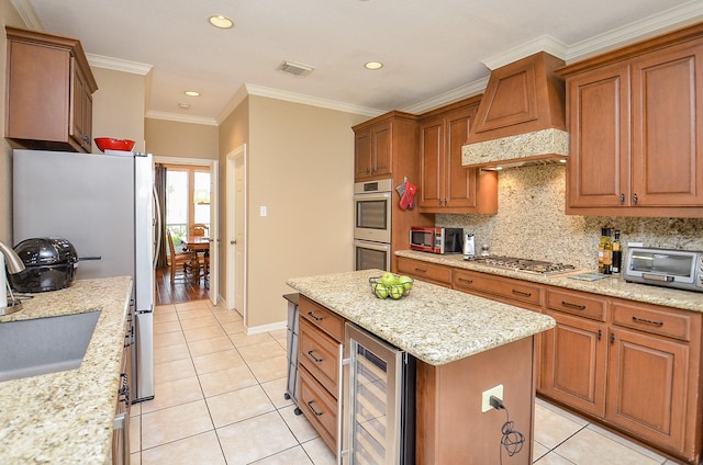 13023 Forester Canyon Ln, Sugar Land, TX 77498 - kitchen with wine cooler, appliances with stainless steel finishes, light tile patterned flooring, backsplash, and custom exhaust hood