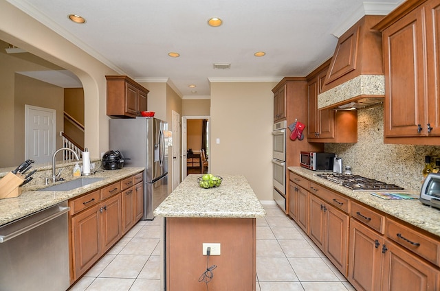 13023 Forester Canyon Ln, Sugar Land, TX 77498 - kitchen with appliances with stainless steel finishes, a kitchen island, custom exhaust hood, decorative backsplash, and a sink