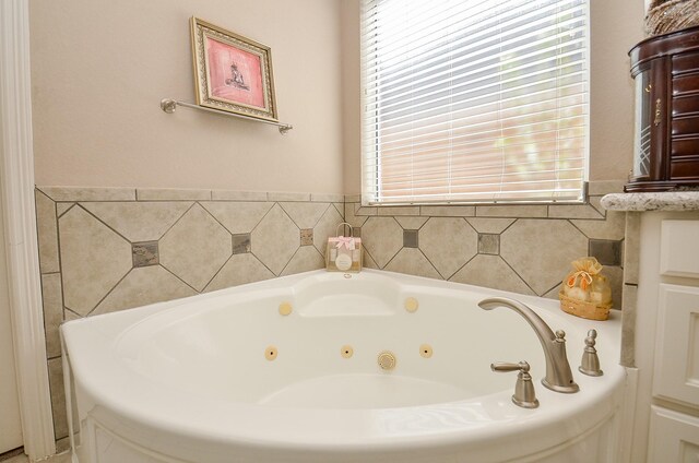 13023 Forester Canyon Ln, Sugar Land, TX 77498 - bathroom with a whirlpool tub
