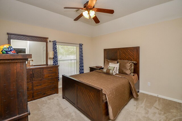13023 Forester Canyon Ln, Sugar Land, TX 77498 - bedroom with light carpet, baseboards, ceiling fan, and lofted ceiling