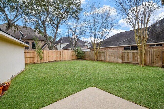 13023 Forester Canyon Ln, Sugar Land, TX 77498 - view of yard featuring a patio area and a residential view