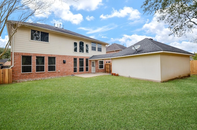 13023 Forester Canyon Ln, Sugar Land, TX 77498 - rear view of property with brick siding and a patio area