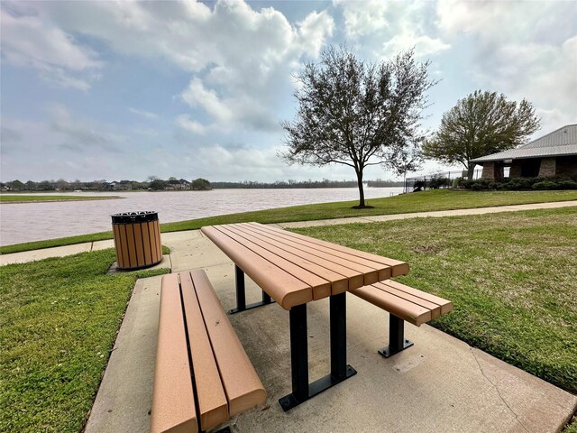 13023 Forester Canyon Ln, Sugar Land, TX 77498 - view of community featuring a yard and a water view