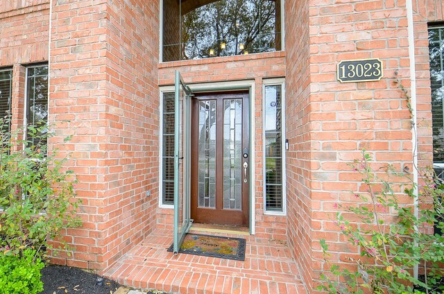 13023 Forester Canyon Ln, Sugar Land, TX 77498 - property entrance with brick siding