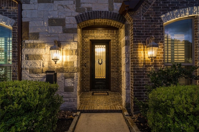 700 Southfield Dr, Friendswood, TX 77546 - view of exterior entry featuring stone siding and brick siding