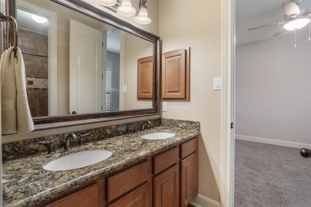 700 Southfield Dr, Friendswood, TX 77546 - bathroom with double vanity and a ceiling fan