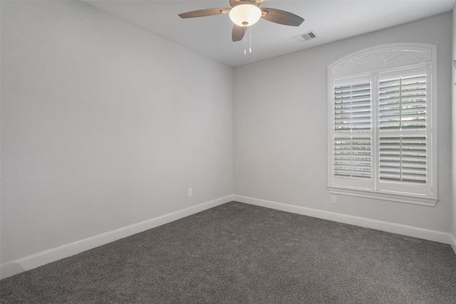 700 Southfield Dr, Friendswood, TX 77546 - spare room featuring dark colored carpet and a ceiling fan