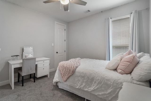 700 Southfield Dr, Friendswood, TX 77546 - carpeted bedroom with baseboards and a ceiling fan