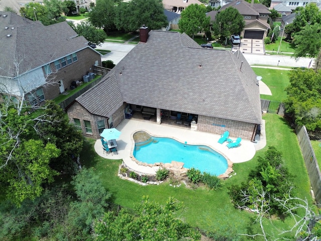 700 Southfield Dr, Friendswood, TX 77546 - view of swimming pool with a patio, a fenced backyard, and a residential view