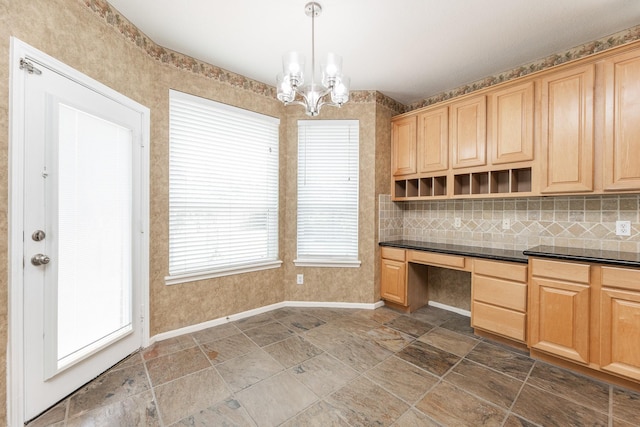 5923 Union Spgs, Sugar Land, TX 77479 - kitchen with light brown cabinets, open shelves, baseboards, and a chandelier