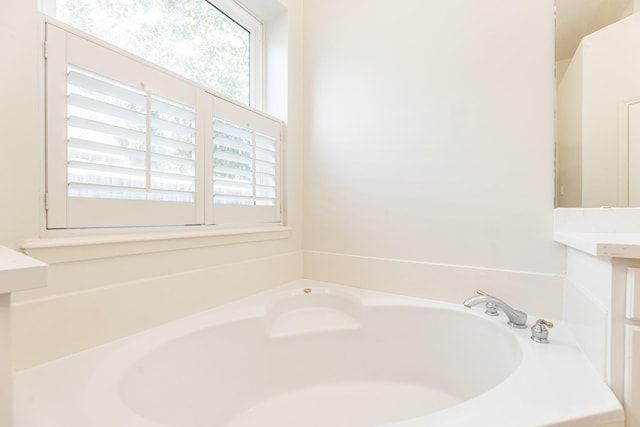 5923 Union Spgs, Sugar Land, TX 77479 - full bathroom with a garden tub and healthy amount of natural light