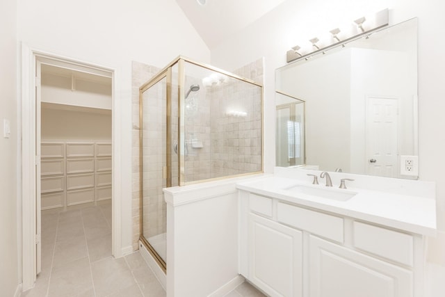 5923 Union Spgs, Sugar Land, TX 77479 - bathroom featuring a shower stall, a spacious closet, vanity, and tile patterned flooring