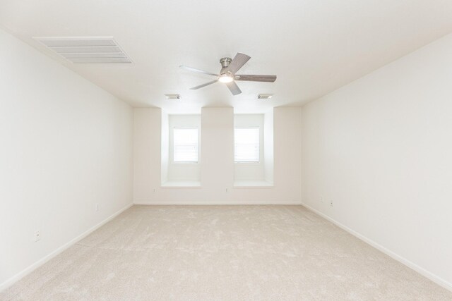 5923 Union Spgs, Sugar Land, TX 77479 - spare room with light colored carpet, ceiling fan, and baseboards