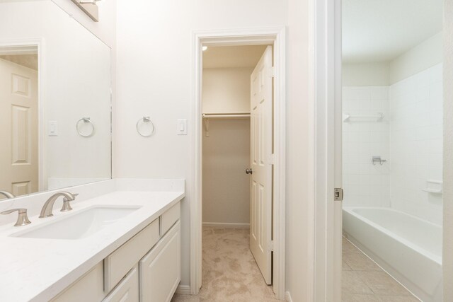 5923 Union Spgs, Sugar Land, TX 77479 - full bath featuring vanity,  shower combination, and a walk in closet