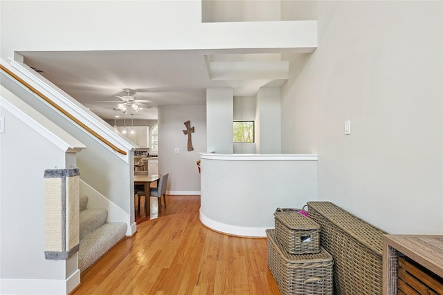 2505 Brinkman St, Houston, TX 77008 - hallway with light wood finished floors, stairs, and baseboards