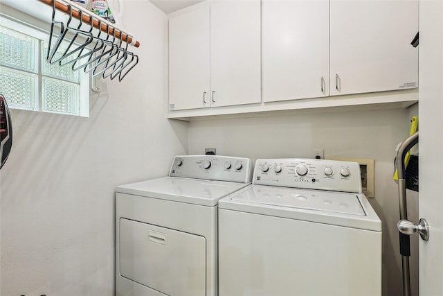 2505 Brinkman St, Houston, TX 77008 - laundry area with independent washer and dryer and cabinet space