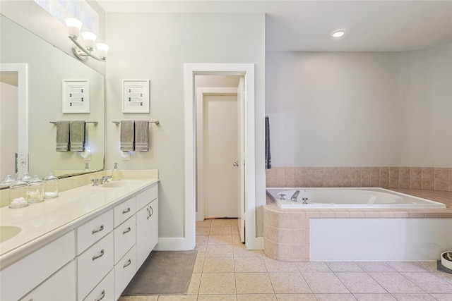 2505 Brinkman St, Houston, TX 77008 - full bath with double vanity, a bath, tile patterned floors, baseboards, and recessed lighting