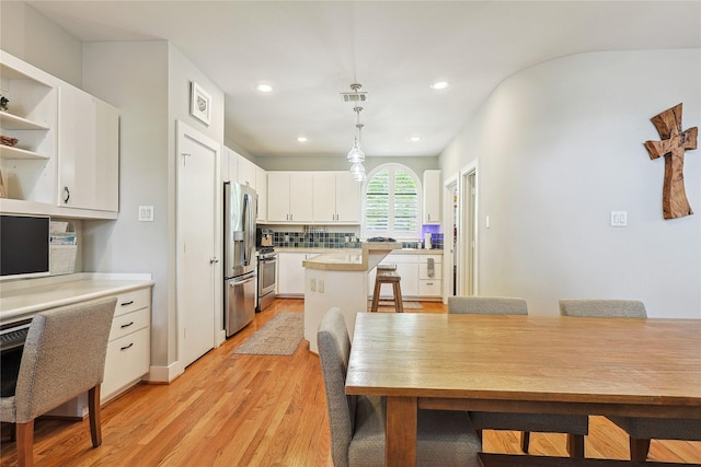 2505 Brinkman St, Houston, TX 77008 - dining space featuring light wood-style floors and recessed lighting