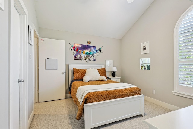 2505 Brinkman St, Houston, TX 77008 - bedroom with light carpet, baseboards, and lofted ceiling