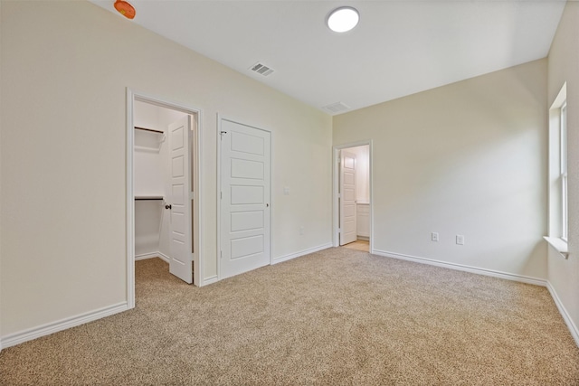 16960 W Dounreay, Montgomery, TX 77316 - unfurnished bedroom featuring carpet floors, a spacious closet, and a closet