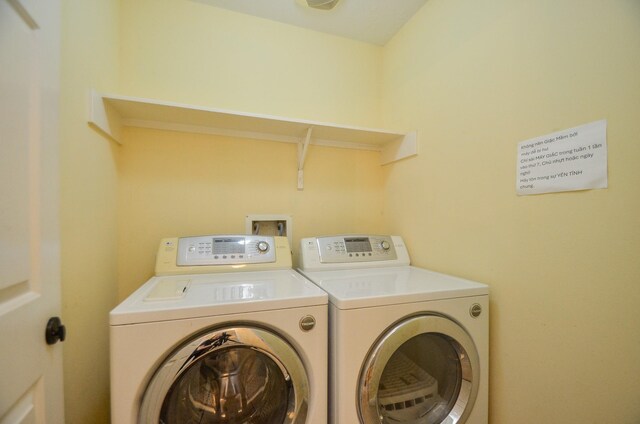 7102 Biton Dr, Houston, TX 77083 - washroom featuring washer and clothes dryer