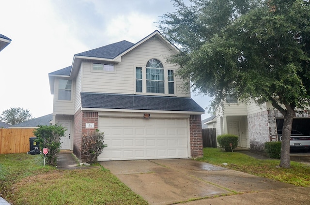 7102 Biton Dr, Houston, TX 77083 - traditional-style home with brick siding, a shingled roof, a garage, and driveway