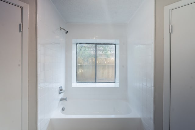 2302 Peaceful Valley Dr, Spring, TX 77373 - full bathroom featuring shower / bathtub combination and a textured ceiling