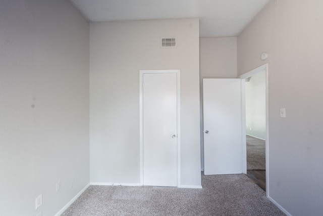 2302 Peaceful Valley Dr, Spring, TX 77373 - unfurnished bedroom featuring carpet flooring and baseboards