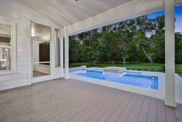 5926 Bit Pl, Baytown, TX 77523 - view of swimming pool featuring a deck, a pool with connected hot tub, view of scattered trees, and a yard