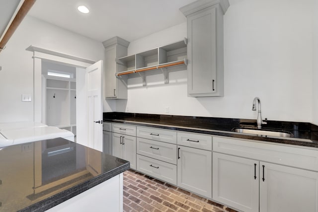 5926 Bit Pl, Baytown, TX 77523 - kitchen featuring a sink, brick patterned floors, open shelves, and recessed lighting