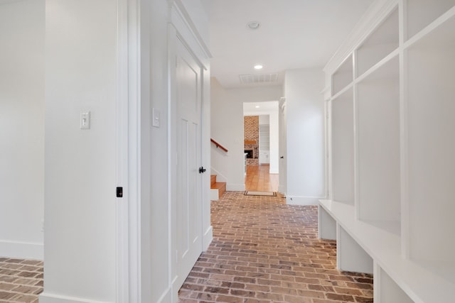 5926 Bit Pl, Baytown, TX 77523 - mudroom featuring brick floors, recessed lighting, and baseboards