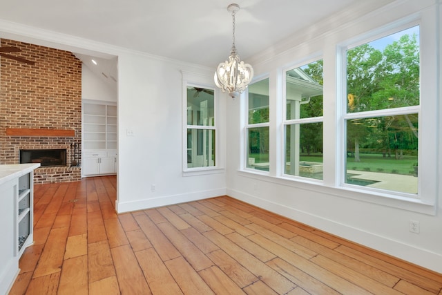 5926 Bit Pl, Baytown, TX 77523 - unfurnished sunroom featuring a chandelier