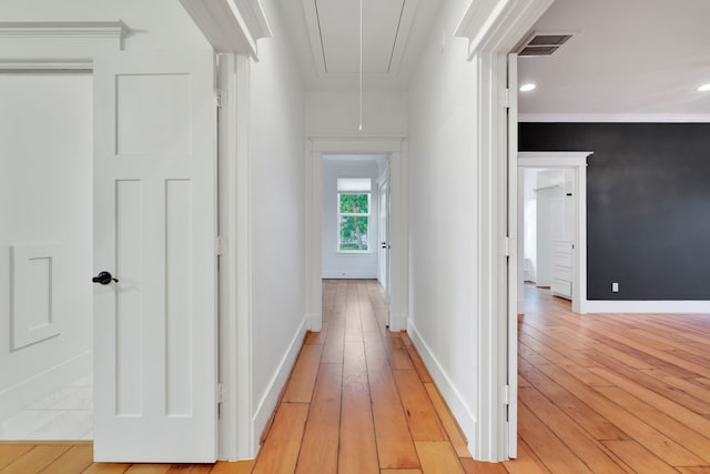 5926 Bit Pl, Baytown, TX 77523 - hallway featuring attic access, light wood finished floors, baseboards, crown molding, and recessed lighting