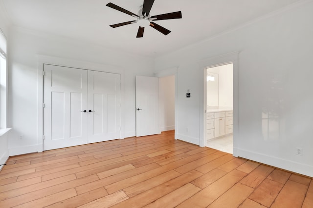 5926 Bit Pl, Baytown, TX 77523 - unfurnished bedroom featuring light wood-style flooring, a closet, baseboards, ornamental molding, and ceiling fan