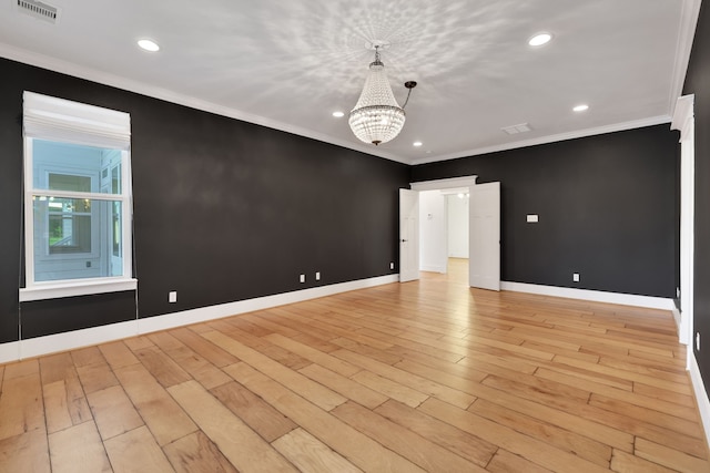5926 Bit Pl, Baytown, TX 77523 - unfurnished room featuring a chandelier, light wood-type flooring, baseboards, crown molding, and recessed lighting