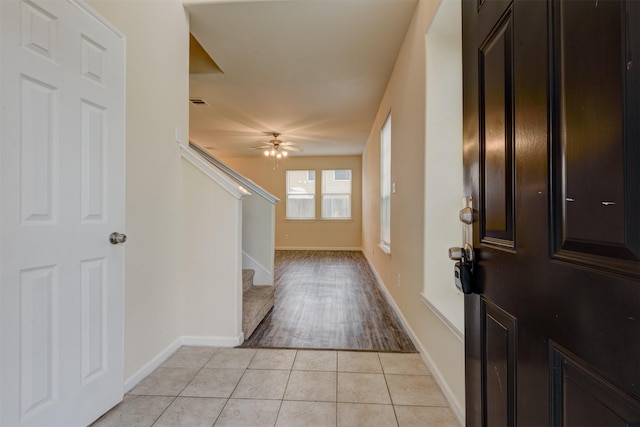 6106 Yorkglen Manor Ln, Houston, TX 77084 - entrance foyer featuring stairs, ceiling fan, and light tile patterned floors