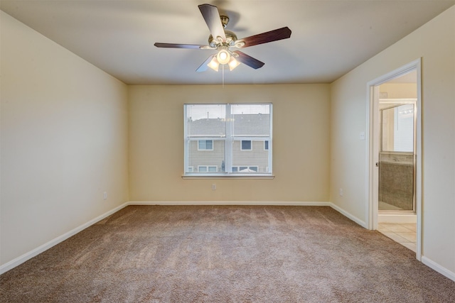6106 Yorkglen Manor Ln, Houston, TX 77084 - carpeted spare room with ceiling fan and baseboards