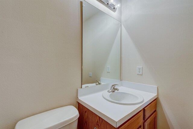 6106 Yorkglen Manor Ln, Houston, TX 77084 - half bathroom featuring vanity and toilet