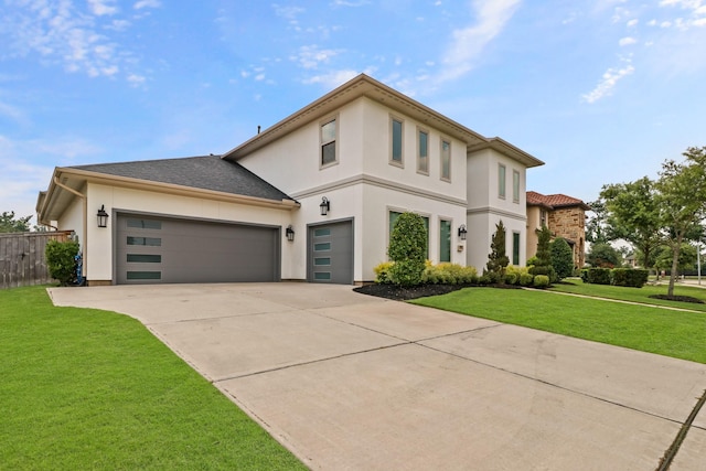 5318 Abington Creek Ln, Sugar Land, TX 77479 - view of front of home with stucco siding, concrete driveway, and an attached garage