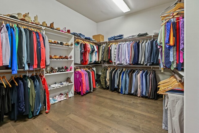 5318 Abington Creek Ln, Sugar Land, TX 77479 - spacious closet featuring wood finished floors