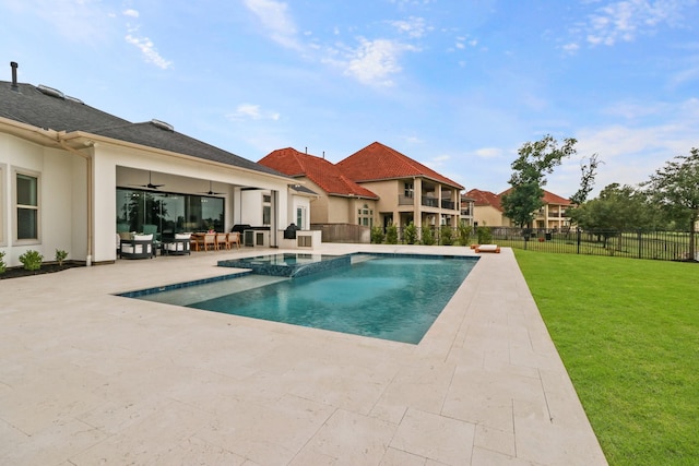 5318 Abington Creek Ln, Sugar Land, TX 77479 - view of swimming pool with a ceiling fan, a patio, a pool with connected hot tub, and outdoor lounge area
